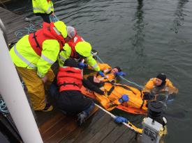 Victim is lifted to dock